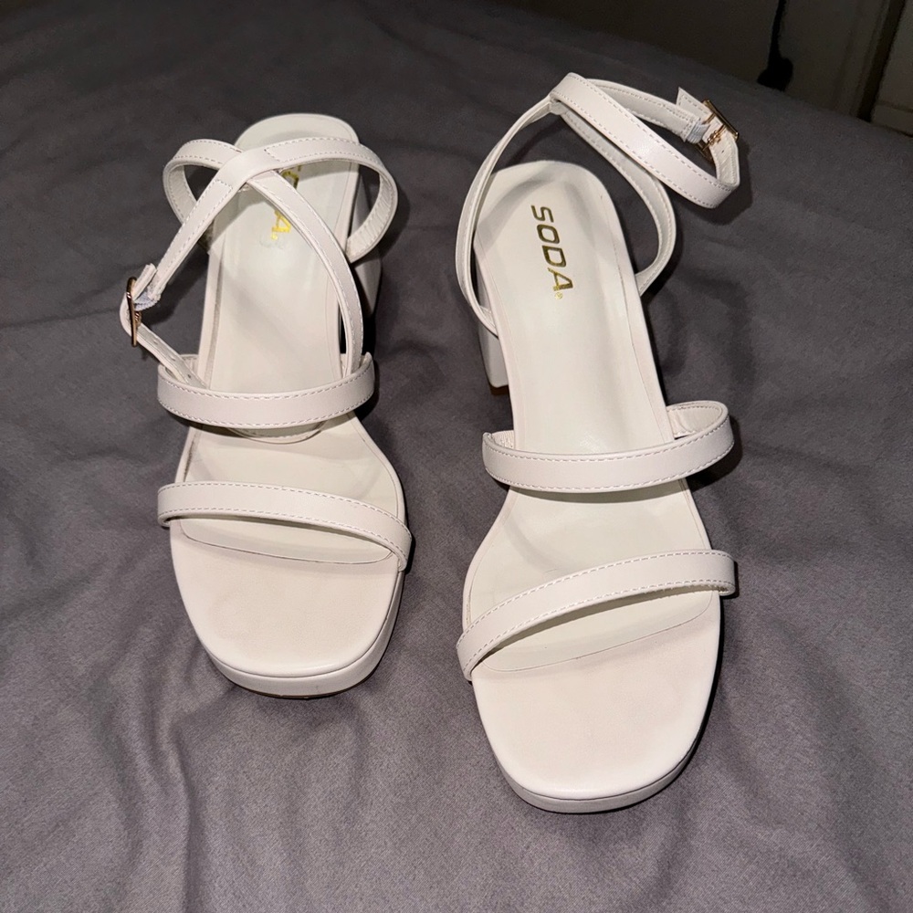 Strappy white heels